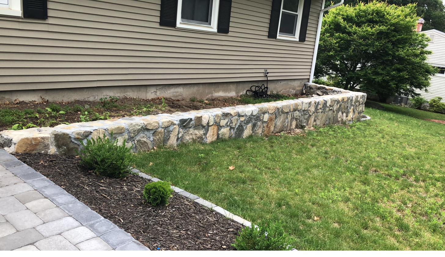 Stone wall and paver edging — Dias Souza Construction