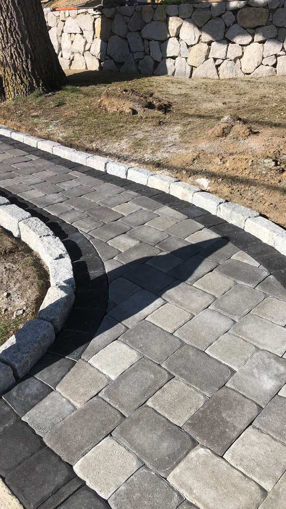 Curved cobblestone walkway