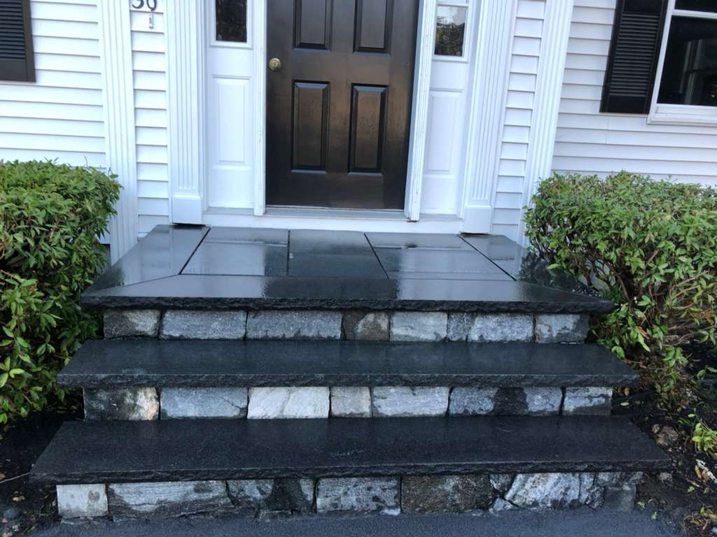 Black granite steps, granite block risers
